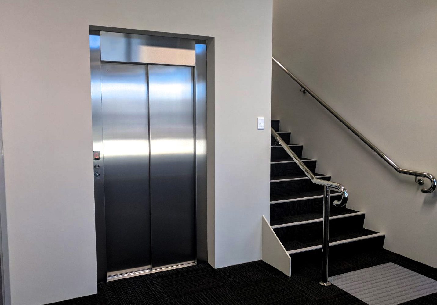 Commercial Lift Next To Stairs